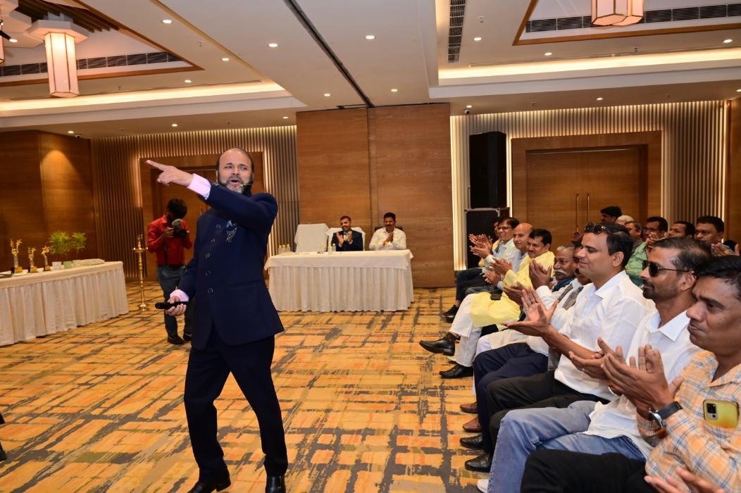  Deepak Kapoor interacting with audience during training program
