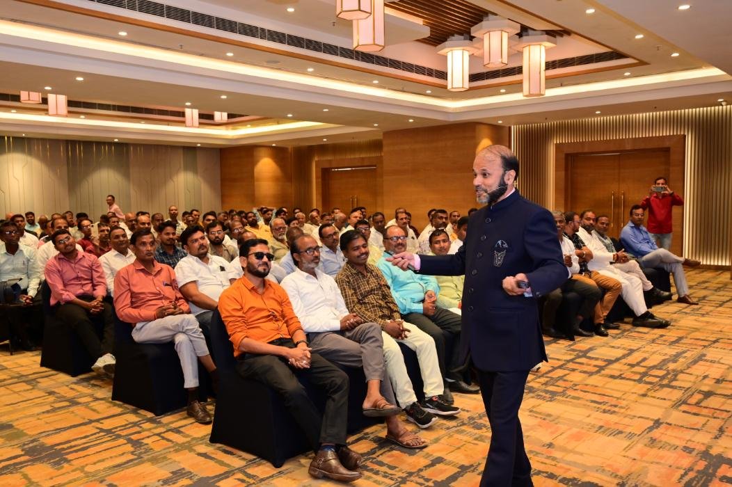 Deepak Kapoor speaking at inspirational development event 